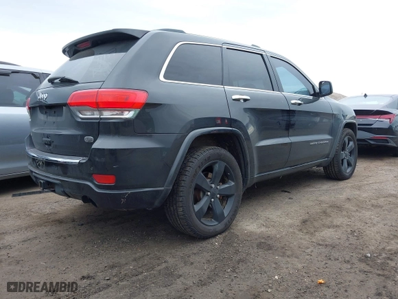 2014 Jeep Grand Cherokee Overland with VIN 1C4RJFCG6EC121654, listed as a IAAI auction lot 42051730 with 163,853 mi miles. Bid and sale history available at carsss.com. Image 4.