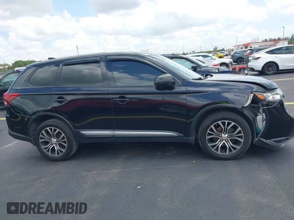 2017 Mitsubishi Outlander ES z VIN JA4AZ2A3XHZ052168, wystawiony jako IAAI lot #42194062 z przebiegiem 209 195 mil mil oraz . Historia ofert i sprzedaży dostępna na DreamBid. Obrazek 13.