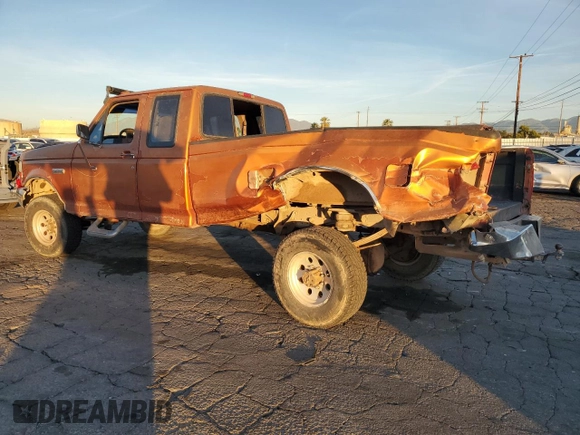1994 Ford F-250 with VIN 1FTHX25F2RKB78761, listed as a Copart auction lot 85764054 with 223,641 mi miles and Salvage Title. Bid and sale history available at carsss.com. Image 2.