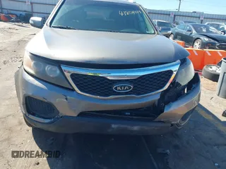 2012 Kia Sorento LX with VIN 5XYKTDA25CG235127, listed as a IAAI auction lot 41804019 with 176,000 mi miles. Bid and sale history available at carsss.com. Image 6.