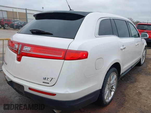 2014 Lincoln MKT EcoBoost with VIN 2LMHJ5AT0EBL50661, listed as a IAAI auction lot 41898237 with 118,770 mi miles and . Bid and sale history available at DreamBid. Image 4.