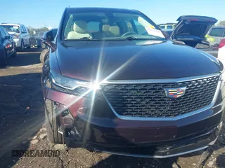 2021 Cadillac XT6 Premium Luxury with VIN 1GYKPDRS7MZ133561, listed as a IAAI auction lot 41112365 with 73,956 mi miles. Bid and sale history available at carsss.com. Image 6.