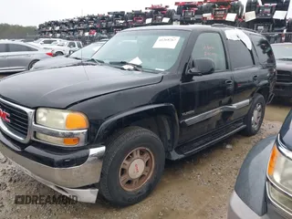 2004 GMC Yukon SLT z VIN 1GKEC13V34J307919, wystawiony jako IAAI lot #41268767 z przebiegiem Nie podano mil oraz . Historia ofert i sprzedaży dostępna na DreamBid. Obrazek 2.