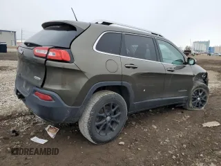 2015 Jeep Cherokee Latitude z VIN 1C4PJMCS7FW515406, wystawiony jako Copart lot #52331155 z przebiegiem 129 815 mil mil oraz Szkoda całkowita • Salvage title. Historia ofert i sprzedaży dostępna na DreamBid. Obrazek 3.