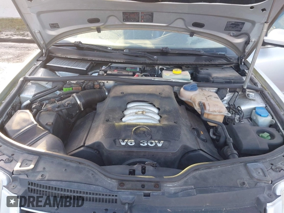 2004 Volkswagen Passat GLX with VIN WVWRH63B34P057015, listed as a IAAI auction lot 41659722 with 114,225 mi miles and . Bid and sale history available at DreamBid. Image 10.