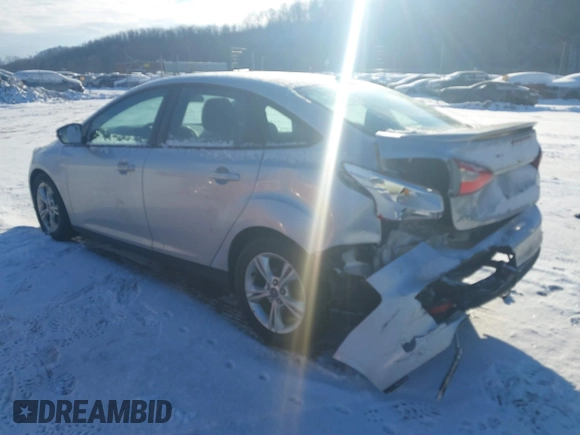 2012 Ford Focus SE with VIN 1FAHP3F27CL457213, listed as a IAAI auction lot 41303904 with 215,044 mi miles and . Bid and sale history available at DreamBid. Image 3.