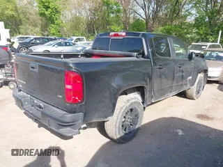 2021 Chevrolet Colorado 4WD Z71 with VIN 1GCGTDEN5M1167486, listed as a IAAI auction lot 42124990 with 162,297 mi miles and . Bid and sale history available at DreamBid. Image 4.