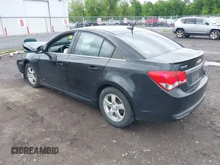 2014 Chevrolet Cruze 1LT z VIN 1G1PC5SB6E7138943, wystawiony jako IAAI lot #42368233 z przebiegiem 119 760 mil mil oraz . Historia ofert i sprzedaży dostępna na DreamBid. Obrazek 3.