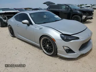 2013 Scion FR-S z VIN JF1ZNAA11D1704767, wystawiony jako Copart lot #52250275 z przebiegiem 82 246 mil mil oraz Czysty tytuł • Clean title. Historia ofert i sprzedaży dostępna na DreamBid. Obrazek 4.