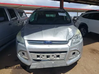 2013 Ford Escape SE with VIN 1FMCU0GX9DUB83512, listed as a IAAI auction lot 41970256 with 69,897 mi miles and . Bid and sale history available at DreamBid. Image 12.