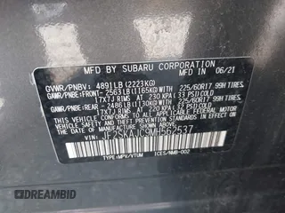 2021 Subaru Forester Premium z VIN JF2SKAJC9MH562537, wystawiony jako IAAI lot #42673896 z przebiegiem 66 819 mil mil oraz . Historia ofert i sprzedaży dostępna na DreamBid. Obrazek 9.