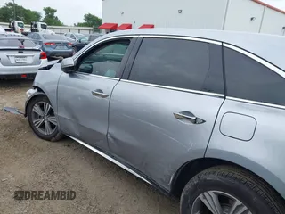 2020 Acura MDX with VIN 5J8YD3H32LL016504, listed as a IAAI auction lot 42126961 with 90,307 mi miles and . Bid and sale history available at DreamBid. Image 15.