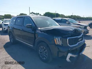2024 Kia Telluride LX z VIN 5XYP24GC6RG482724, wystawiony jako IAAI lot #41806081 z przebiegiem 37 700 mil mil oraz . Historia ofert i sprzedaży dostępna na DreamBid. Obrazek 1.