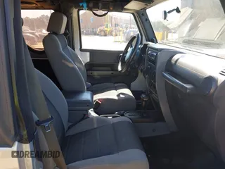 2007 Jeep Wrangler X z VIN 1J4FA24187L143478, wystawiony jako IAAI lot #41782412 z przebiegiem 138 913 mil mil oraz . Historia ofert i sprzedaży dostępna na DreamBid. Obrazek 5.