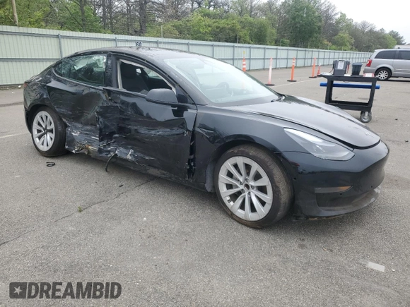 2022 Tesla Model 3 z VIN 5YJ3E1EA9NF285649, wystawiony jako Copart lot #59193635 z przebiegiem Nie podano mil oraz Szkoda całkowita • Salvage title. Historia ofert i sprzedaży dostępna na DreamBid. Obrazek 4.