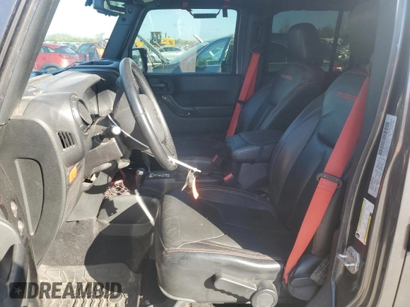 2017 Jeep Wrangler Unlimited Rubicon z VIN 1C4BJWFGXHL737844, wystawiony jako Copart lot #53044635 z przebiegiem 49 286 mil mil oraz Czysty tytuł • Clean title. Historia ofert i sprzedaży dostępna na DreamBid. Obrazek 7.