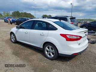 2012 Ford Focus SE with VIN 1FAHP3F2XCL122141, listed as a IAAI auction lot 42008877 with 122,743 mi miles. Bid and sale history available at carsss.com. Image 3.