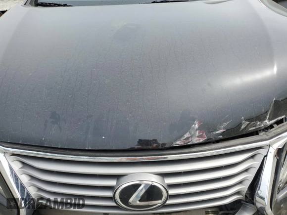 2015 Lexus RX 350 z VIN 2T2BK1BAXFC309922, wystawiony jako Copart lot #57360725 z przebiegiem 189 139 mil mil oraz Szkoda całkowita • Salvage title. Historia ofert i sprzedaży dostępna na DreamBid. Obrazek 12.