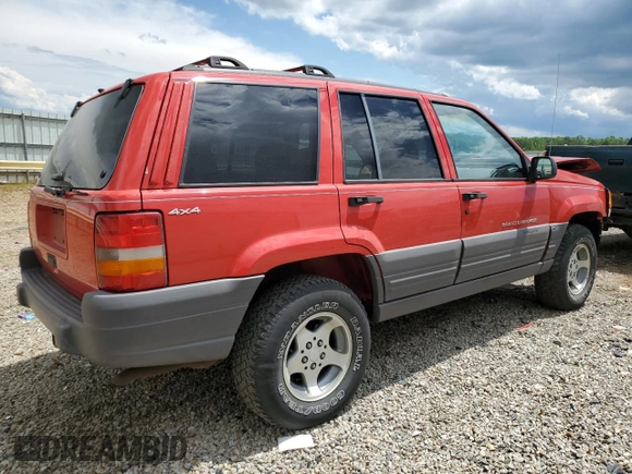 1997 Jeep Grand Cherokee Laredo with VIN 1J4GZ58S3VC739922, listed as a Copart auction lot 55667885 with 209,075 mi miles and Salvage title. Bid and sale history available at DreamBid. Image 3.