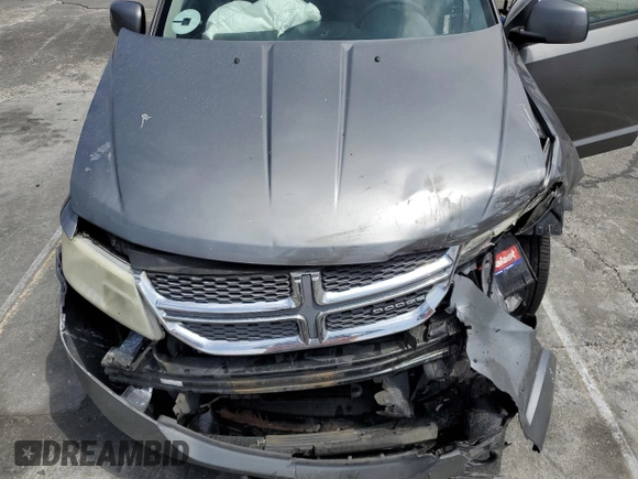 2012 Dodge Journey SXT with VIN 3C4PDCBG6CT207952, listed as a Copart auction lot 60334565 with Not provided miles and Salvage title. Bid and sale history available at DreamBid. Image 11.