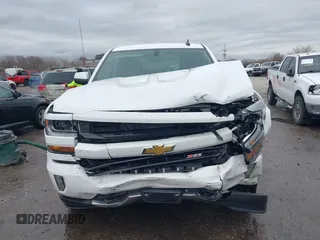 2018 Chevrolet Silverado 1500 LT with VIN 3GCUKREC3JG453433, listed as a IAAI auction lot 38138441 with 53,496 mi miles. Bid and sale history available at carsss.com. Image 12.