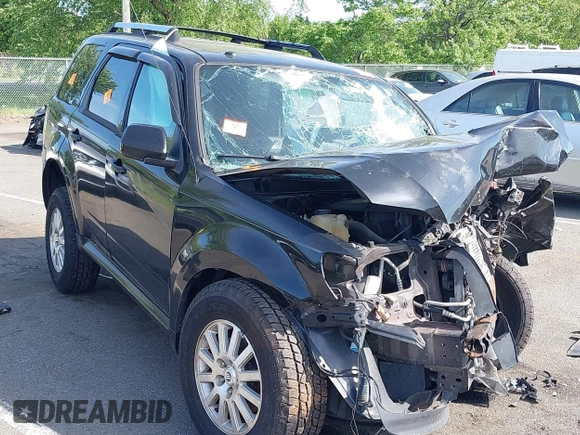 2011 Mercury Mariner Premier with VIN 4M2CN9HG7BKJ01459, listed as a IAAI auction lot 42231597 with 168,362 mi miles and . Bid and sale history available at DreamBid. Image 1.