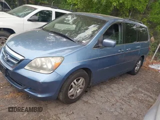 2005 Honda Odyssey EX-L with VIN 5FNRL38685B113633, listed as a IAAI auction lot 42035706 with 320,335 mi miles. Bid and sale history available at carsss.com. Image 2.