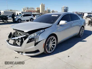 2018 Cadillac XTS with VIN 2G61L5S34J9134469, listed as a Copart auction lot 46660945 with 122,011 mi miles and Salvage Title. Bid and sale history available at carsss.com. Image 1.