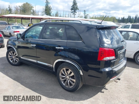 2012 Kia Sorento SX with VIN 5XYKWDA26CG258262, listed as a IAAI auction lot 42068704 with 124,832 mi miles. Bid and sale history available at carsss.com. Image 3.