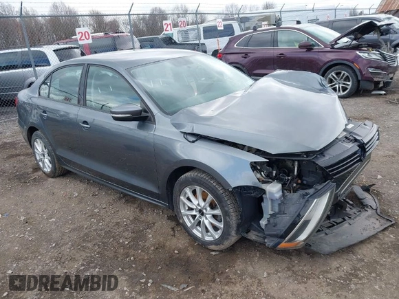 2014 Volkswagen Jetta SE z VIN 3VWD17AJ9EM358777, wystawiony jako IAAI lot #41880077 z przebiegiem 161 985 mil mil oraz . Historia ofert i sprzedaży dostępna na DreamBid. Obrazek 1.