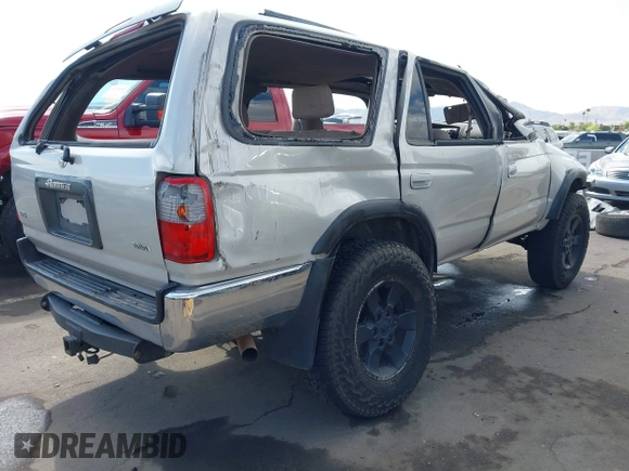 1998 Toyota 4Runner SR5 z VIN JT3HN86R2W0172312, wystawiony jako IAAI lot #42214433 z przebiegiem 259 170 mil mil oraz . Historia ofert i sprzedaży dostępna na DreamBid. Obrazek 4.
