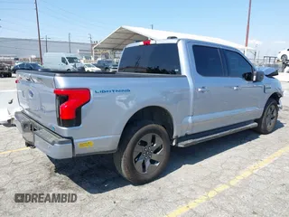 2022 Ford F-150 Lightning Pro с VIN 1FT6W1EV0NWG05515, выставлен на аукционе IAAI как лот 42343136 с пробегом 49 544 миль миль и . История ставок и продаж доступна на DreamBid. Изображение 4.