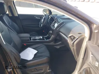 2020 Ford Edge Titanium with VIN 2FMPK3K94LBB37706, listed as a IAAI auction lot 42524373 with 77,849 mi miles and . Bid and sale history available at DreamBid. Image 5.