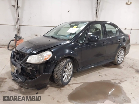 2010 Suzuki SX4 with VIN JS2YC5A40A6300005, listed as a IAAI auction lot 41810017 with 101,896 mi miles and . Bid and sale history available at DreamBid. Image 2.