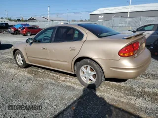 2002 Oldsmobile Alero GL1 z VIN 1G3NL52E62C265560, wystawiony jako Copart lot #56466914 z przebiegiem 206 213 mil mil oraz Szkoda całkowita • Salvage title. Historia ofert i sprzedaży dostępna na DreamBid. Obrazek 2.