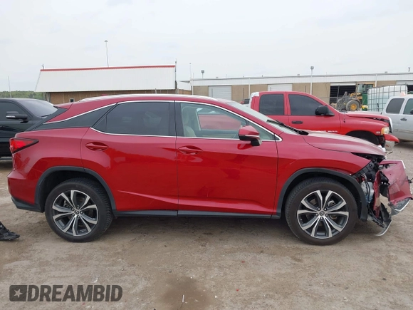 2022 Lexus RX 350 with VIN JTJHZMDAXN2058225, listed as a IAAI auction lot 42059802 with 63,407 mi miles and . Bid and sale history available at DreamBid. Image 14.