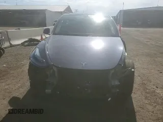 2023 Tesla Model Y Long Range z VIN 7SAYGDEE7PF965446, wystawiony jako Copart lot #54710375 z przebiegiem 23 807 mil mil oraz Szkoda całkowita • Salvage title. Historia ofert i sprzedaży dostępna na DreamBid. Obrazek 15.