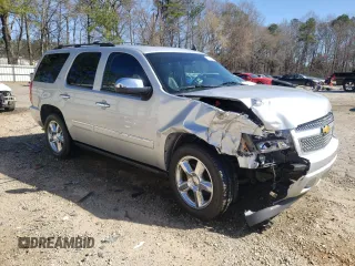 2013 Chevrolet Tahoe LTZ with VIN 1GNSCCE03DR374265, listed as a Copart auction lot 49290765 with 206,584 mi miles and Salvage title. Bid and sale history available at DreamBid. Image 4.