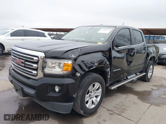 2015 GMC Canyon 2WD SLE with VIN 1GTG5BE30F1139093, listed as a IAAI auction lot 41596657 with 143,834 mi miles. Bid and sale history available at carsss.com. Image 2.