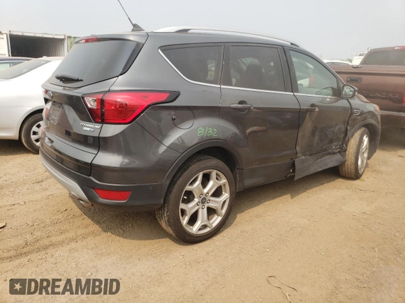 2019 Ford Escape Titanium with VIN 1FMCU9J98KUA56391, listed as a Copart auction lot 59215935 with 27,056 mi miles and Salvage title. Bid and sale history available at DreamBid. Image 3.