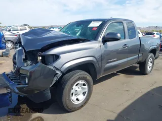 2018 Toyota Tacoma SR with VIN 5TFRX5GN8JX116802, listed as a IAAI auction lot 41879503 with 86,448 mi miles and . Bid and sale history available at DreamBid. Image 2.
