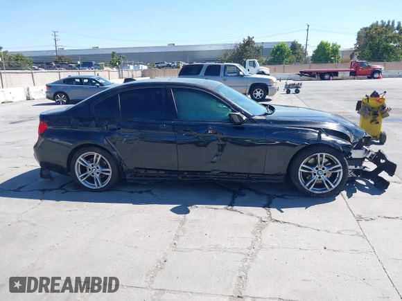 2014 BMW 3 Series 328i with VIN WBA3C1C54EK112620, listed as a IAAI auction lot 42712414 with 169,297 mi miles and . Bid and sale history available at DreamBid. Image 14.