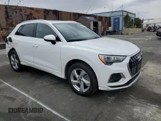 2021 Audi Q3 Premium with VIN WA1AUCF39M1061658, listed as a Copart auction lot 50717875 with 87,363 mi miles and Salvage title. Bid and sale history available at DreamBid. Image 4.