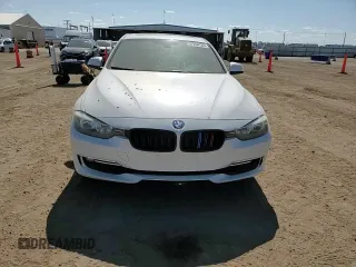 2013 BMW 3 Series 328i xDrive with VIN WBA3B3C51DF532714, listed as a Copart auction lot 57854735 with 140,650 mi miles and Salvage title. Bid and sale history available at DreamBid. Image 13.
