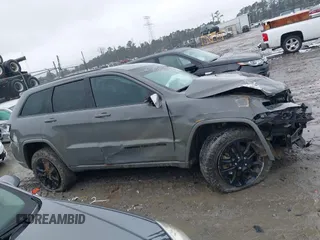 2021 Jeep Grand Cherokee Laredo X z VIN 1C4RJFAG9MC590268, wystawiony jako IAAI lot #41614514 z przebiegiem 60 933 mil mil oraz . Historia ofert i sprzedaży dostępna na DreamBid. Obrazek 14.