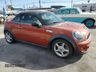 2013 MINI Coupe S z VIN WMWSX3C59DT466802, wystawiony jako Copart lot #56860965 z przebiegiem 88 053 mil mil oraz Szkoda całkowita • Salvage title. Historia ofert i sprzedaży dostępna na DreamBid. Obrazek 4.