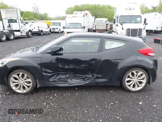 2012 Hyundai Veloster w/Gray Int z VIN KMHTC6AD0CU080630, wystawiony jako IAAI lot #42191015 z przebiegiem 48 405 mil mil oraz . Historia ofert i sprzedaży dostępna na DreamBid. Obrazek 14.