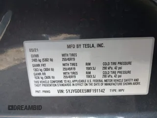 2021 Tesla Model Y Long Range with VIN 5YJYGDEE5MF191142, listed as a IAAI auction lot 41448514 with 71,626 mi miles. Bid and sale history available at carsss.com. Image 9.
