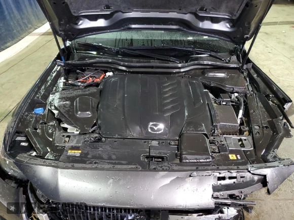 2024 Mazda CX-90 Preferred Plus z VIN JM3KKCHD5R1150177, wystawiony jako Copart lot #52747855 z przebiegiem 35 995 mil mil oraz Nie do naprawy. Historia ofert i sprzedaży dostępna na DreamBid. Obrazek 12.