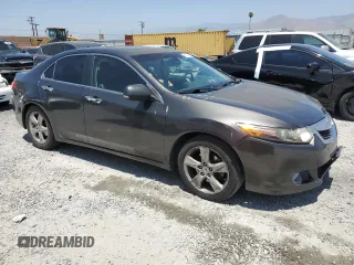 2009 Acura TSX z VIN JH4CU266X9C024552, wystawiony jako Copart lot #60822145 z przebiegiem 210 678 mil mil oraz Szkoda całkowita • Salvage title. Historia ofert i sprzedaży dostępna na DreamBid. Obrazek 4.